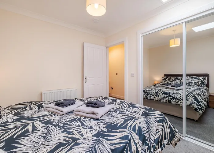 Spacious 2-Bedroom Condo With Free Parking On Site
